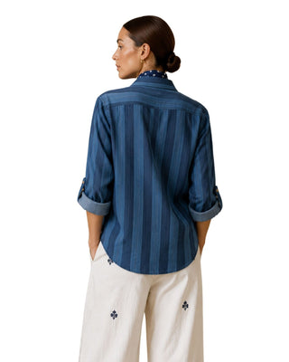 Ronan Striped Chambray Button-Down in blue, back view showing wide tonal stripes and curved hem