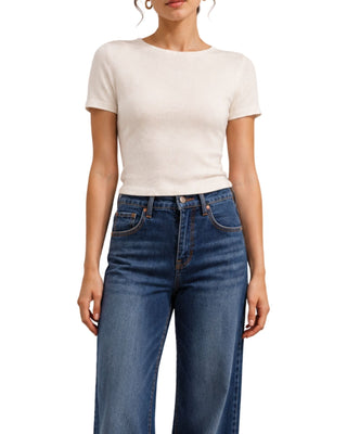 Ivey Rolled Edge Ultra Soft Crop Sweater in cream, close-up of the crew neck and rolled hem over jeans