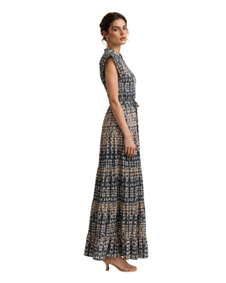 Nina Batik Print Tiered Maxi Dress in navy, side view with cap sleeve and tiered ruffle hem