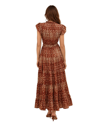 Nina Batik Print Tiered Maxi Dress in rust, back view showing the tiered ruffled hem