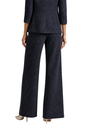 Allison Grid-Check Gold-Button Pants in navy and white, back view of the wide leg and check pattern