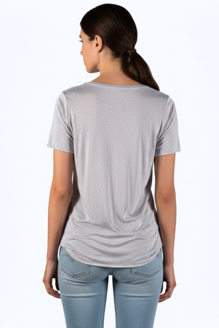 Sady Scoop Neck Tee in taupe grey, back view with a curved hem, worn with light jeans