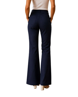 Angela High Rise Flare Pants in navy, back view with welt pockets and flared hems