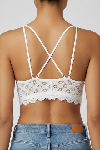Our Lace Bralette in white, back view showing crossed straps and lace back panel