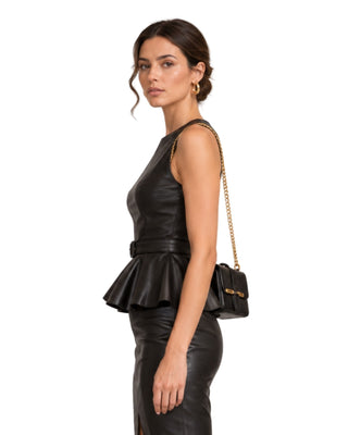 Sienna Faux Leather Belted Top in black, side view showing the belt and flared peplum