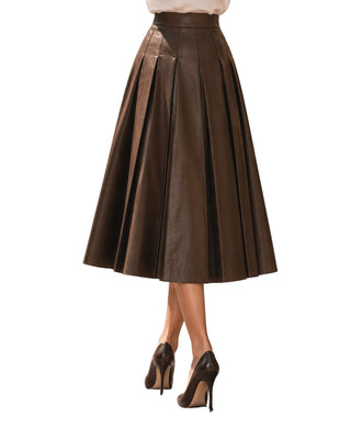 The Pleated Faux Leather Midi Skirt – back view on model