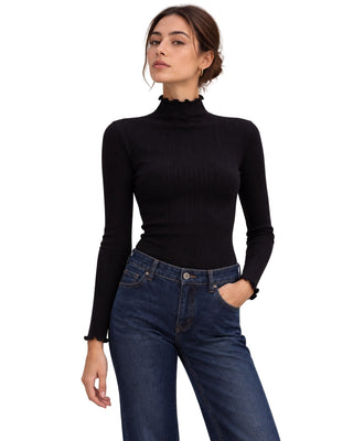 Gabby Longsleeve Top in black, front view with ruffled mock neck and cuffs, worn with dark wash jeans