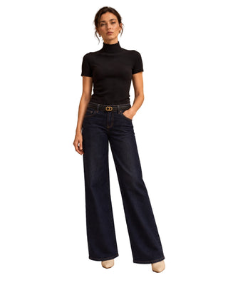 Bri Short Sleeve Sweater in black, full-length front view with mock neck, worn with wide leg dark jeans