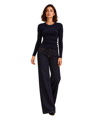 Perfect Long Sleeve in navy, full front view with fitted ribbed body, worn with dark wide-leg jeans