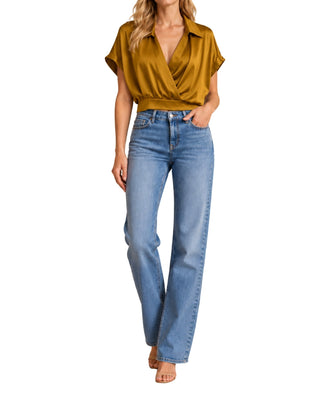 Veronica Silky Top in gold brown, closer front view of the wrap neckline and fitted waistband