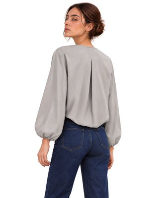 The Angie Faux Leather Peplum Zip Jacket – back view on model