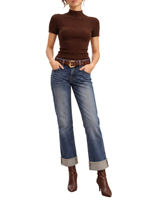 The Evelyn Straight Cuffed Jeans – front view on model, styled with a brown top and belt