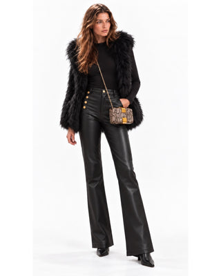 Sky Fur Hooded Vest, Seamless Bodysuit and Bianca Imperial Pants in black, full-length front view with snakeskin bag