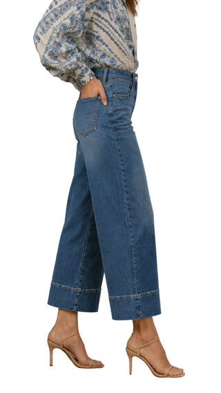 Sasha Seam-Front Jeans in mid-wash, angled side view showing back pocket and wide cuff